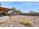 Large backyard with covered patio and ample space at 11025 W Lane Ave, Glendale, AZ 85307