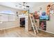 Bedroom with built-in loft bed, desk, and ample closet space at 11025 W Lane Ave, Glendale, AZ 85307