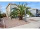 Two-story house with a palm tree in the front yard at 11025 W Lane Ave, Glendale, AZ 85307