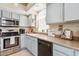 Kitchen features stainless steel appliances and light blue cabinets at 11025 W Lane Ave, Glendale, AZ 85307