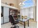 Bright kitchen features a chandelier and large window at 11025 W Lane Ave, Glendale, AZ 85307