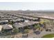 Aerial view of the house, highlighting its location in a quiet, residential neighborhood at 122 E Orange Blossom Path, Queen Creek, AZ 85140