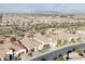 Aerial view showing home's location in a community with other houses and landscape at 122 E Orange Blossom Path, Queen Creek, AZ 85140