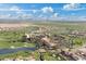 Aerial view of a community with golf course and resort amenities at 122 E Orange Blossom Path, Queen Creek, AZ 85140