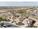 Aerial view showcasing the home's position within a residential neighborhood at 122 E Orange Blossom Path, Queen Creek, AZ 85140