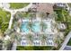 Aerial view of a refreshing community pool area with ample lounge space at 122 E Orange Blossom Path, Queen Creek, AZ 85140