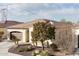 Single-story home with desert landscaping at 122 E Orange Blossom Path, Queen Creek, AZ 85140