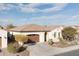 Single-story home with landscaped yard at 122 E Orange Blossom Path, Queen Creek, AZ 85140