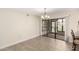 Bright dining area with sliding glass doors leading to a patio at 12510 W Brandywine Dr, Sun City West, AZ 85375