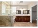 Elegant bathroom with double vanity, granite countertop, and glass shower at 1270 E Marcella Ln, Gilbert, AZ 85295