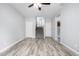 Gathering room with wood-like floors and staircase at 1270 E Marcella Ln, Gilbert, AZ 85295