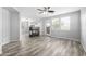 Living room with fireplace and wood-look floors at 1270 E Marcella Ln, Gilbert, AZ 85295