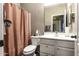 Clean bathroom with a shower/tub combo, vanity, and toilet at 1374 E Kingman Pl, Casa Grande, AZ 85122