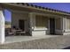 Covered patio with seating area, perfect for outdoor dining at 1374 E Kingman Pl, Casa Grande, AZ 85122