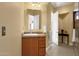 Modern bathroom with wood cabinets and tiled floor at 15418 N Castillo Dr, Fountain Hills, AZ 85268