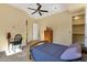 Bedroom with wood bed frame and private closet at 15418 N Castillo Dr, Fountain Hills, AZ 85268