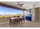 Kitchen dining area with a wood table and mountain views at 15418 N Castillo Dr, Fountain Hills, AZ 85268