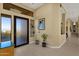 Bright entryway with glass door and tiled floor at 15418 N Castillo Dr, Fountain Hills, AZ 85268