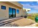 Home exterior showcasing a patio and access to the backyard at 15418 N Castillo Dr, Fountain Hills, AZ 85268