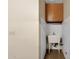 Laundry room with utility sink and cabinets at 15418 N Castillo Dr, Fountain Hills, AZ 85268