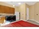 Bright laundry room with washer, dryer, and cabinets at 15418 N Castillo Dr, Fountain Hills, AZ 85268