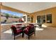 Relaxing patio with seating area and pool view at 15418 N Castillo Dr, Fountain Hills, AZ 85268