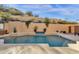 Relaxing pool area with a waterfall and mountain views at 15418 N Castillo Dr, Fountain Hills, AZ 85268