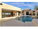 Inviting pool area with spacious patio, built-in barbecue, and mountain views at 15418 N Castillo Dr, Fountain Hills, AZ 85268