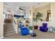 Cozy sitting area with blue armchairs and built-in shelving at 15418 N Castillo Dr, Fountain Hills, AZ 85268