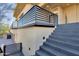 Modern gray tile stairs leading to a balcony at 15418 N Castillo Dr, Fountain Hills, AZ 85268