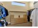 Large walk-in closet with ample shelving and drawers at 15418 N Castillo Dr, Fountain Hills, AZ 85268