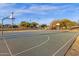 Outdoor basketball court with markings and goals at 160 W La Vieve Ln, Tempe, AZ 85284