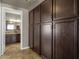 Bathroom with dark wood cabinets and tile floor at 160 W La Vieve Ln, Tempe, AZ 85284