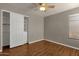 Bedroom with large closet and wood floors at 160 W La Vieve Ln, Tempe, AZ 85284