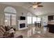 Kitchen dining area with tiled floor, table and chairs, and access to backyard at 160 W La Vieve Ln, Tempe, AZ 85284