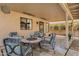 Covered patio with seating area and tile floor at 160 W La Vieve Ln, Tempe, AZ 85284