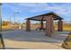 Park pavilion with picnic tables near tennis courts at 160 W La Vieve Ln, Tempe, AZ 85284