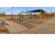 Sand-based playground with swings and playset at 160 W La Vieve Ln, Tempe, AZ 85284