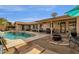 Lush backyard with a sparkling pool and patio at 160 W La Vieve Ln, Tempe, AZ 85284