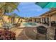 Backyard with pool, swing, and patio furniture at 160 W La Vieve Ln, Tempe, AZ 85284