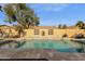 Inviting sparkling pool with a waterfall feature and spacious patio at 160 W La Vieve Ln, Tempe, AZ 85284