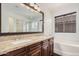 Elegant bathroom with double vanity and soaking tub at 16019 S 40Th Way, Phoenix, AZ 85048