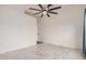 Well-lit bedroom with ceiling fan and marble-look floors at 16019 S 40Th Way, Phoenix, AZ 85048