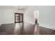 Bright dining room with dark hardwood floors and access to a patio at 16019 S 40Th Way, Phoenix, AZ 85048