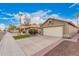 House exterior with a two-car garage and driveway at 16019 S 40Th Way, Phoenix, AZ 85048