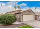 House exterior with a two-car garage and landscaped front yard at 16019 S 40Th Way, Phoenix, AZ 85048