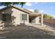 Back of house showing patio, windows and yard at 16508 N 71St Ave, Peoria, AZ 85382