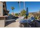 Peaceful backyard with lounge chairs and pool view at 19941 N Summer Dream Dr, Surprise, AZ 85374