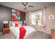 Bright bedroom with a king-size bed and colorful decor at 19941 N Summer Dream Dr, Surprise, AZ 85374