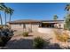 Back exterior view of house with desert landscaping at 19941 N Summer Dream Dr, Surprise, AZ 85374